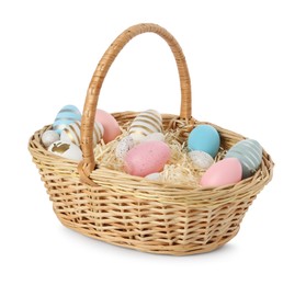 Easter basket with many painted eggs on white background