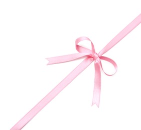 Pink satin ribbon with bow on white background, top view