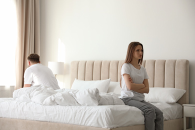 Unhappy couple with problems in relationship at home