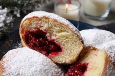Delicious sweet buns with cherries on table, closeup