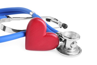 Photo of Stethoscope and red heart isolated on white