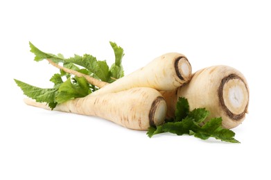 Photo of Tasty fresh ripe parsnips on white background