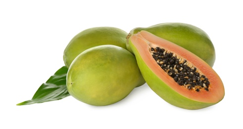 Photo of Fresh ripe papaya fruits with green leaf on white background