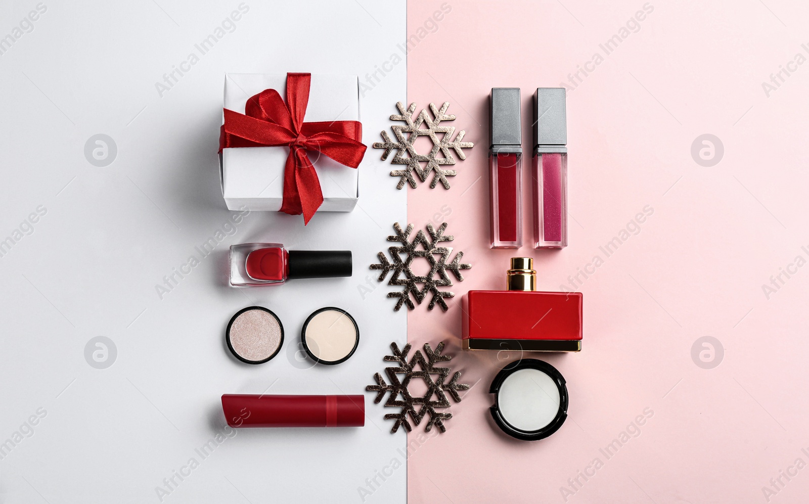 Photo of Flat lay composition with decorative cosmetic products on color background. Winter care