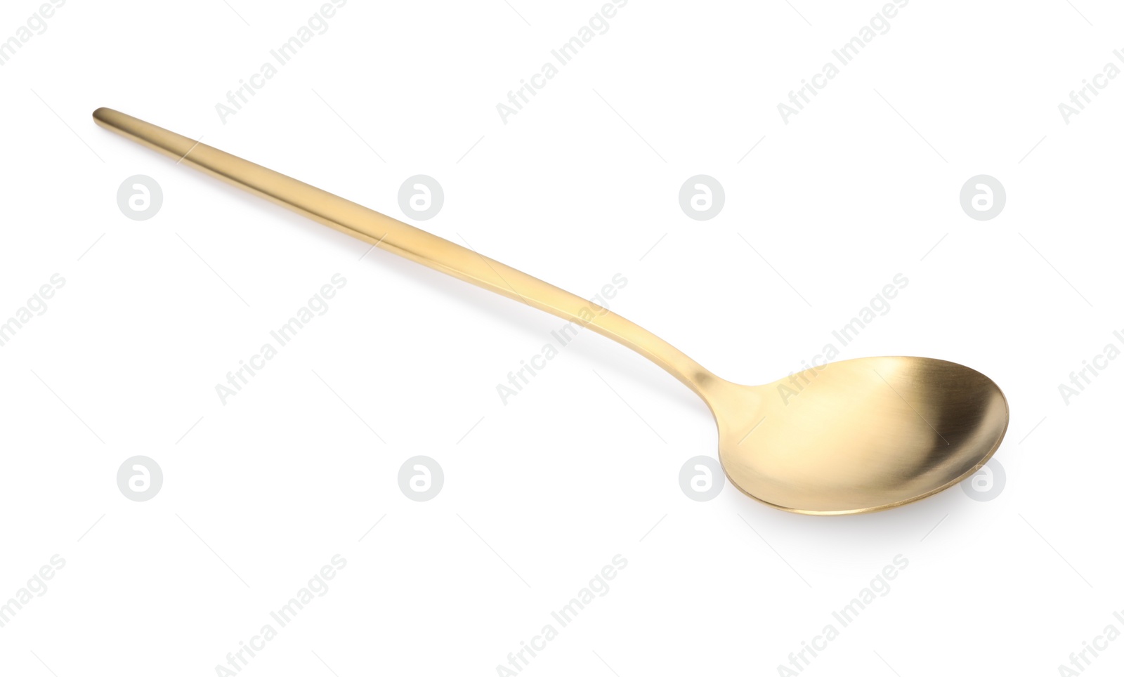 Photo of One shiny golden spoon isolated on white