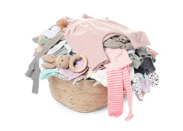 Photo of Laundry basket with baby clothes and soft toy isolated on white