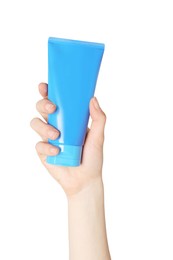 Photo of Woman holding tube of face cleansing product on white background, closeup