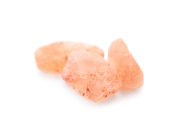 Photo of Crystals of pink himalayan salt isolated on white