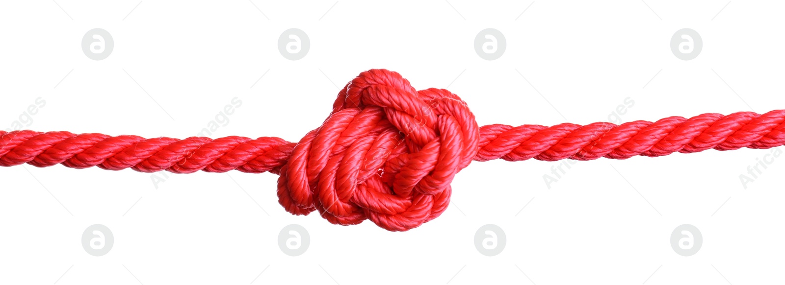 Photo of Red rope with knot on white background