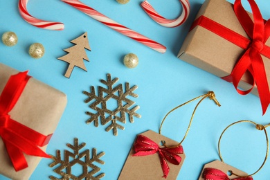 Flat lay composition with Christmas decor on blue background