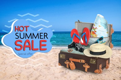 Image of Hot summer sale flyer design. Suitcase with beach accessories on sand near sea and text