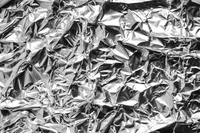 Image of Crumpled silver foil as background, top view