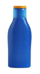 Photo of Blue bottle with sun protection body lotion on white background. Cosmetic product