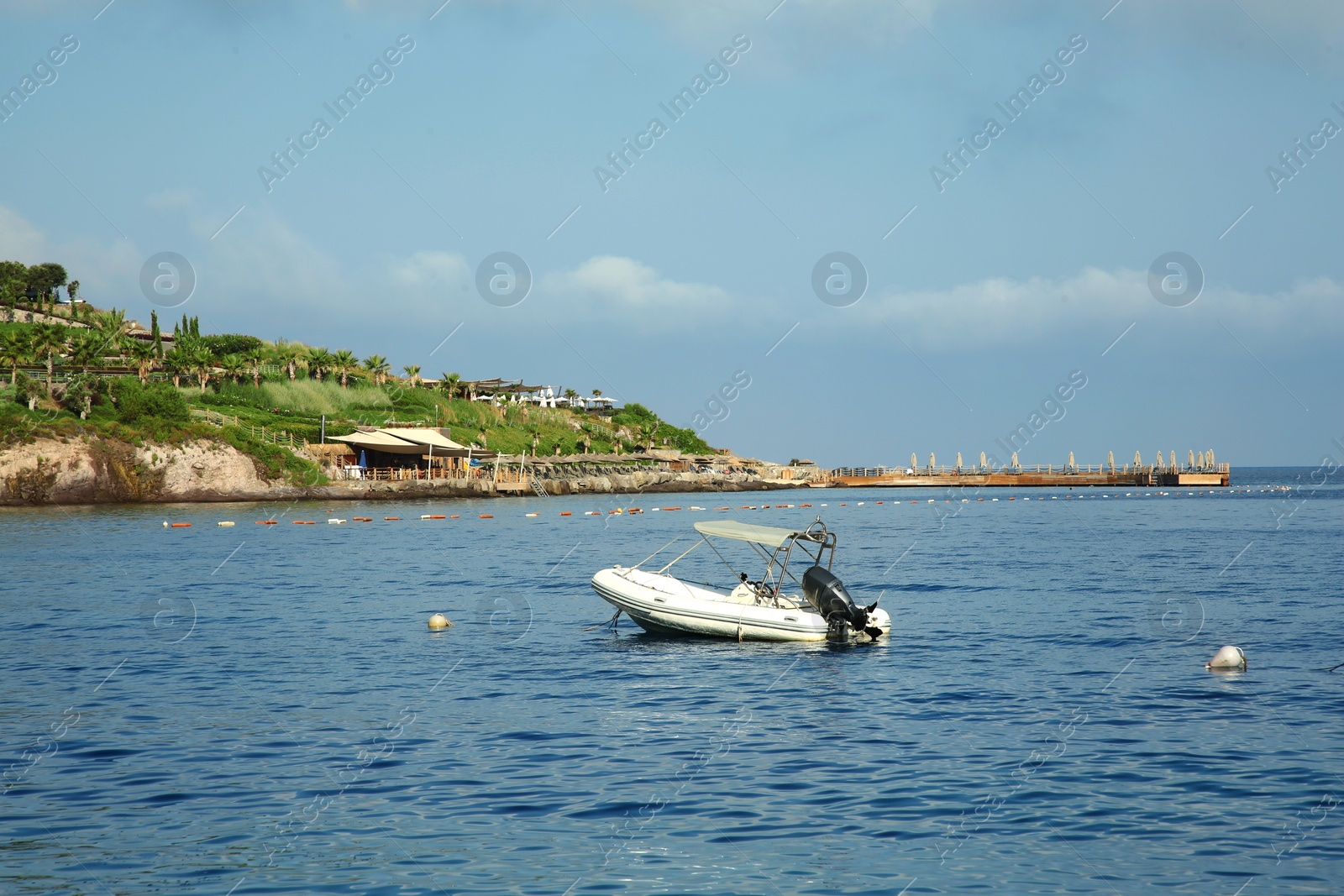 Photo of Inflatable boat on sea under blue sky