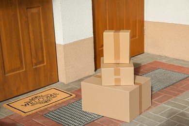 Photo of Stack of parcels delivered near front door