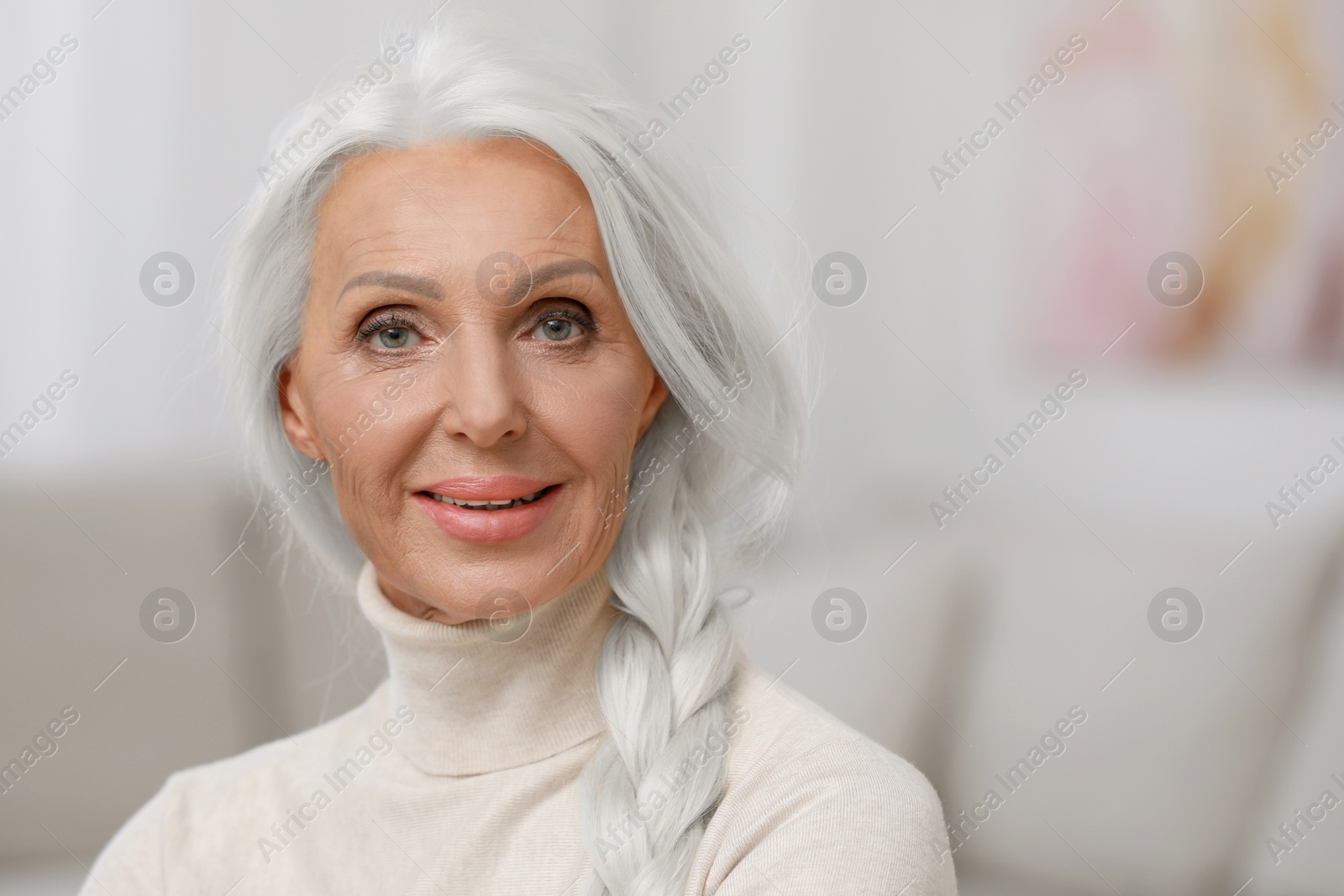 Image of Portrait of beautiful woman with ash hair color indoors. Space for text