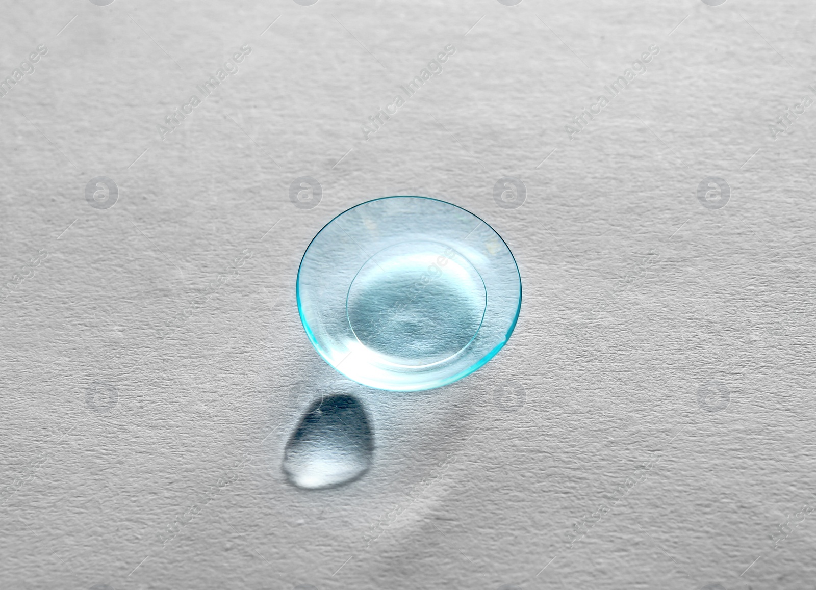 Photo of Contact lens on light background