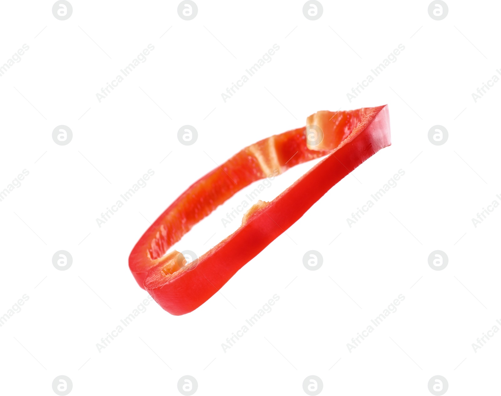 Photo of Slice of ripe red bell pepper isolated on white