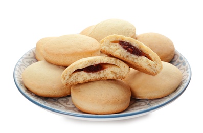 Photo of Plate with cookies for Islamic holidays isolated on white. Eid Mubarak