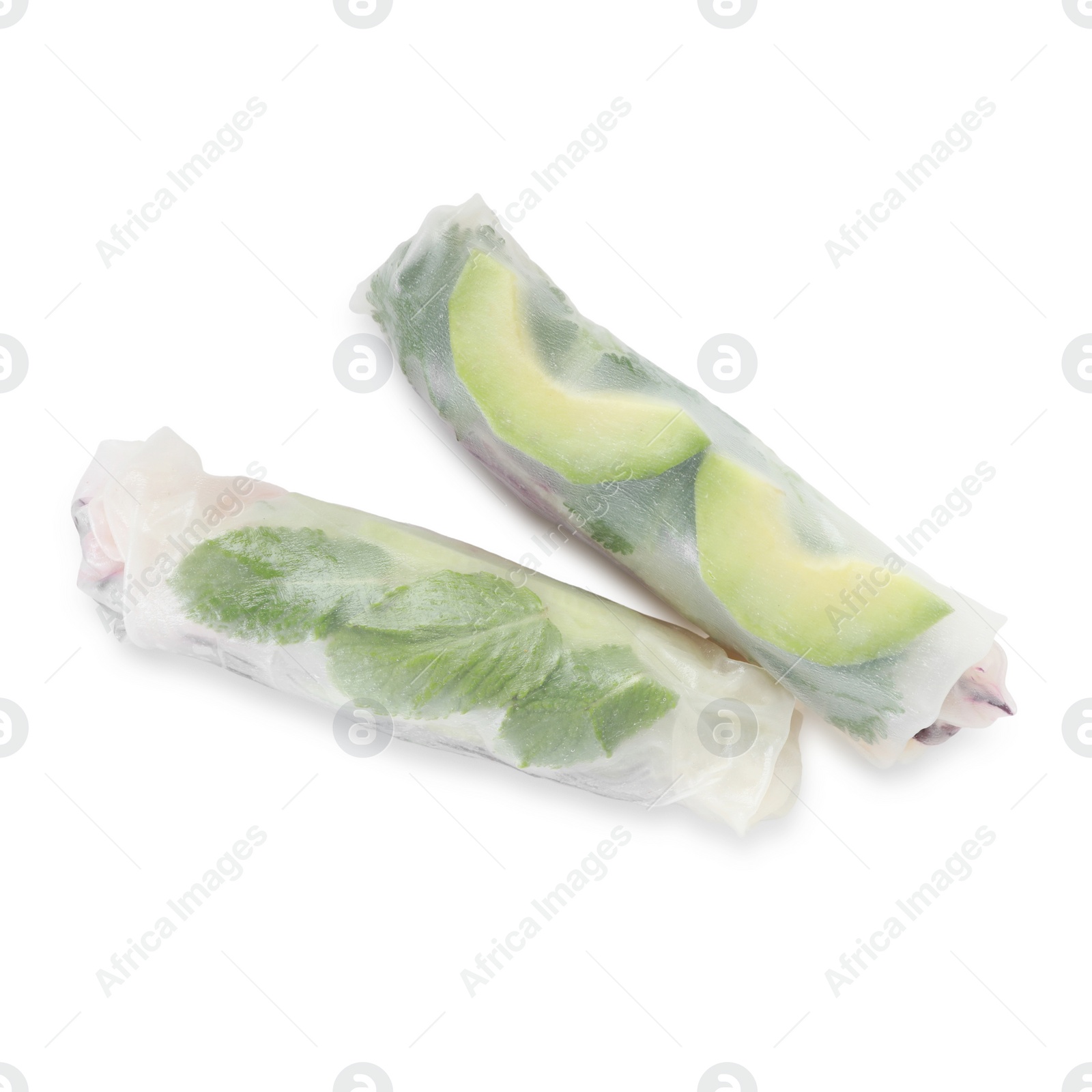 Photo of Delicious spring rolls wrapped in rice paper isolated on white, top view