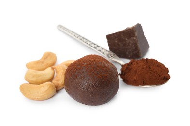 Delicious chocolate truffle with ingredients on white background