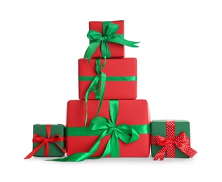 Different Christmas gift boxes on white background