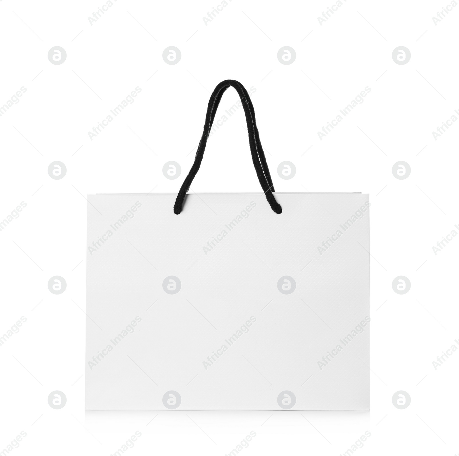 Photo of Paper shopping bag isolated on white. Mock up for design