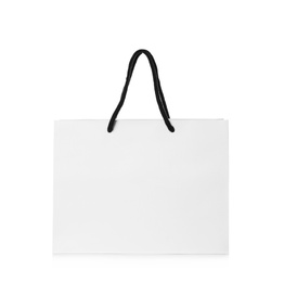 Photo of Paper shopping bag isolated on white. Mock up for design