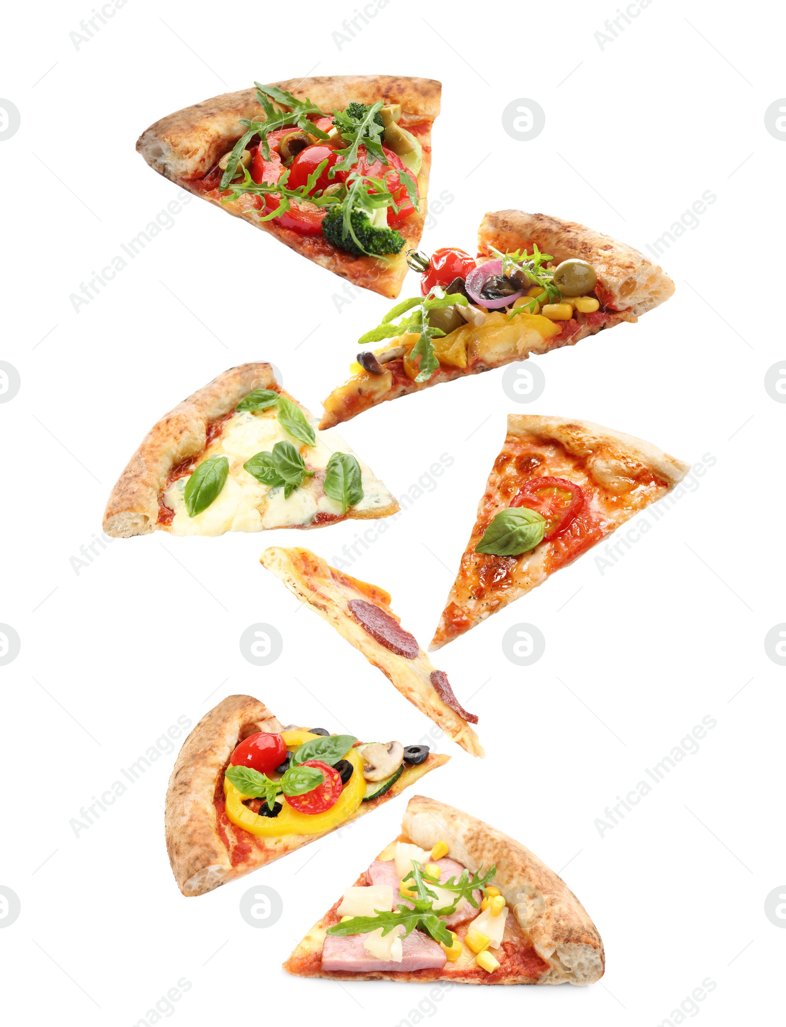 Image of Set with slices of different pizzas falling on white background