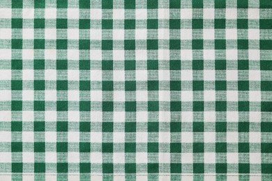 Photo of Green checkered tablecloth as background, top view