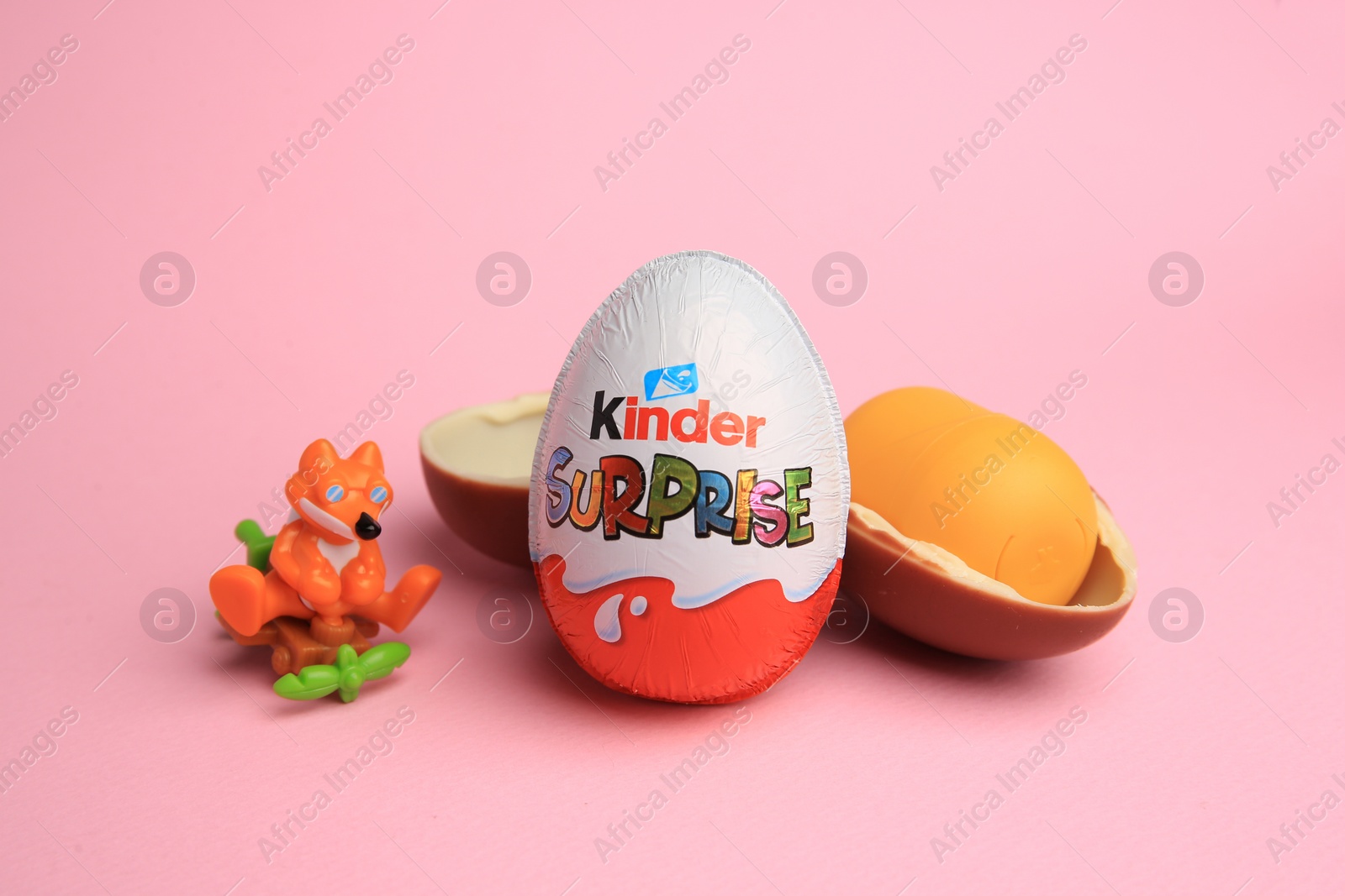 Photo of Sveti Vlas, Bulgaria - July 3, 2023: Kinder Surprise Eggs, plastic capsule and toy on pink background