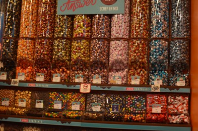 Photo of AMSTERDAM, NETHERLANDS - JULY 16, 2022: Assortment of sweets in Captain Candy shop