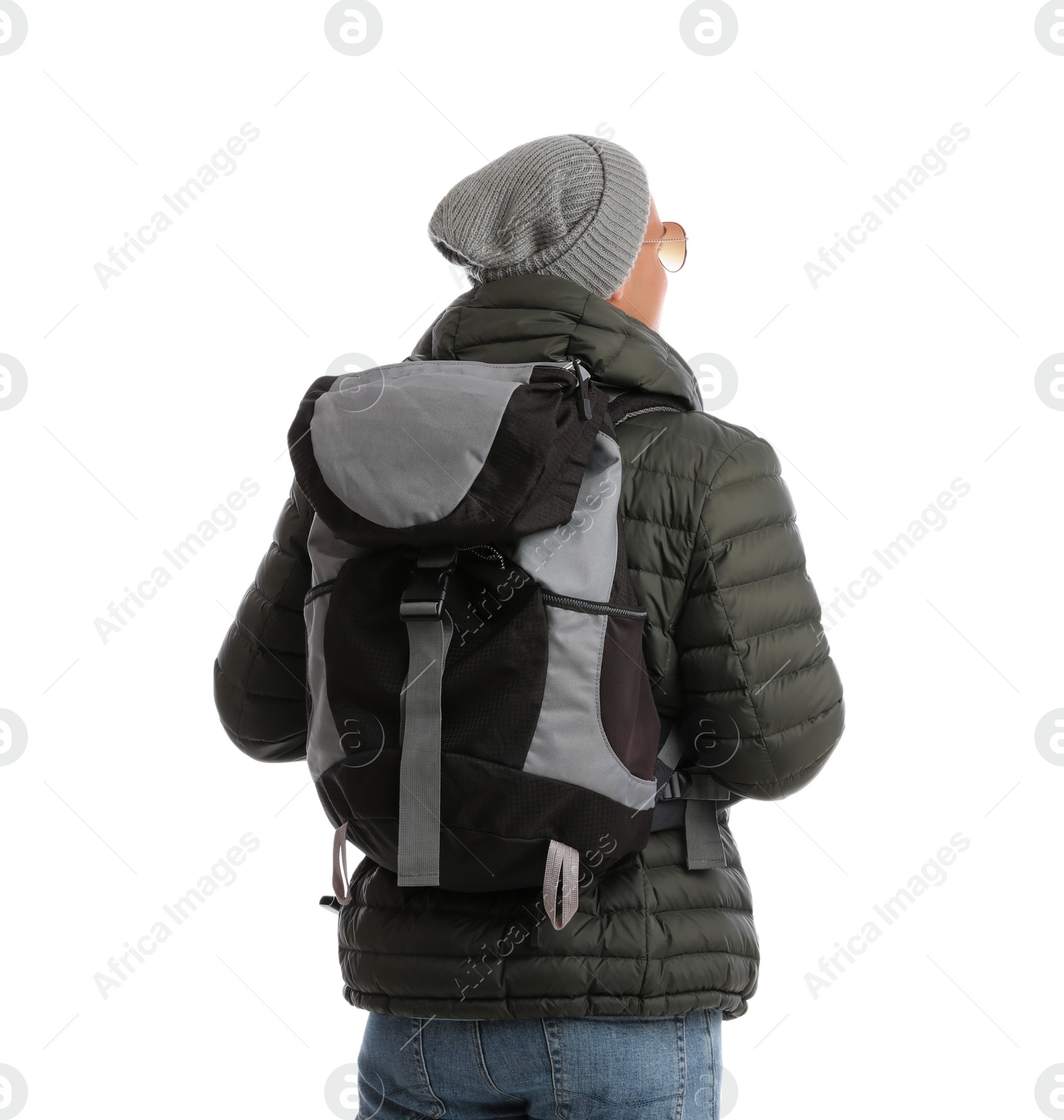 Photo of Man with backpack on white background, back view. Winter travel