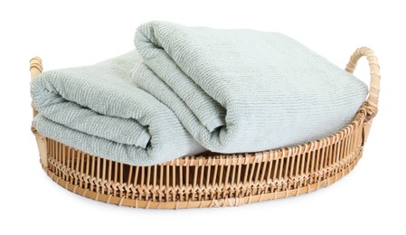 Photo of Basket with soft towels isolated on white