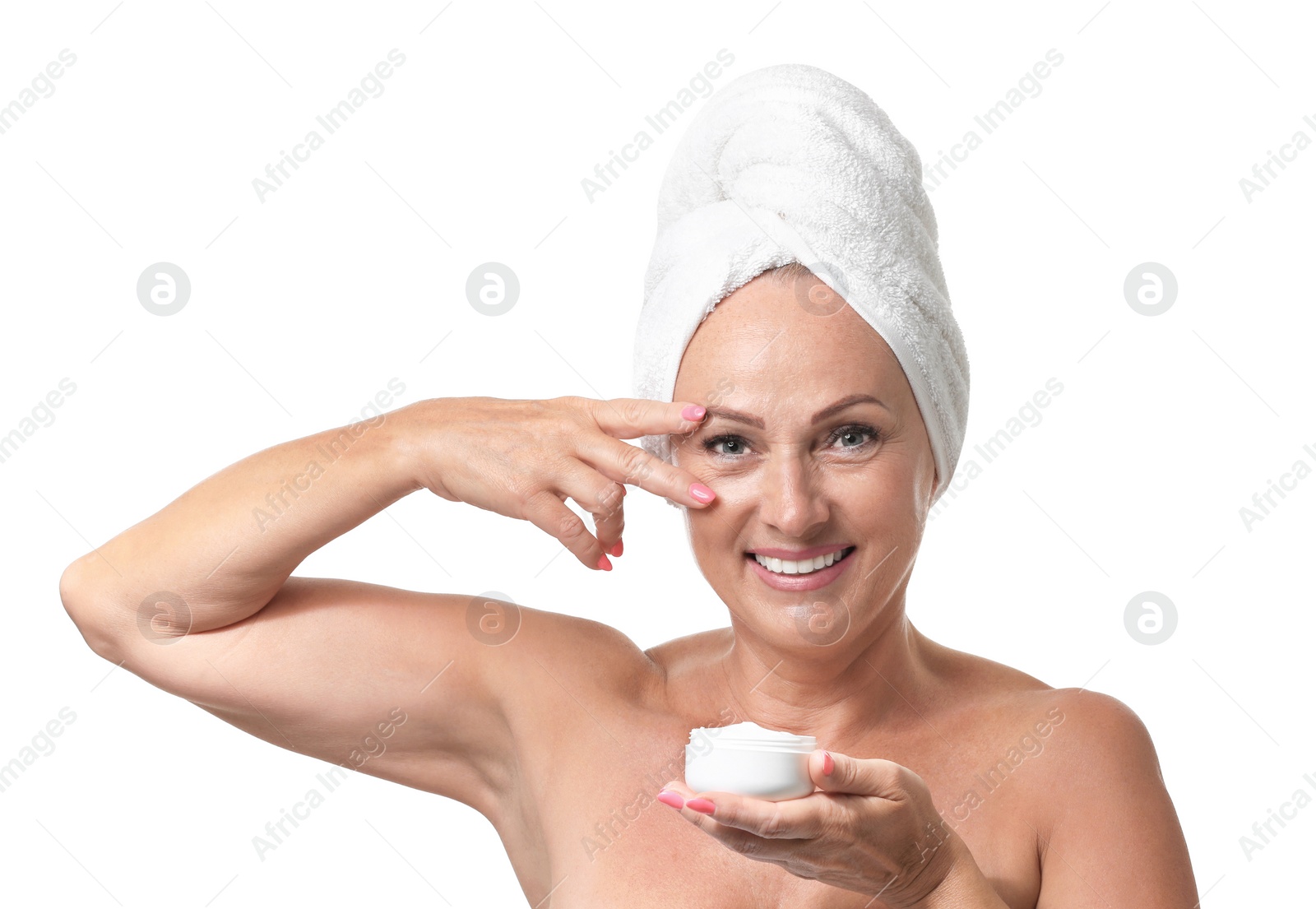 Photo of Portrait of beautiful mature woman with perfect skin holding jar of cream on white background