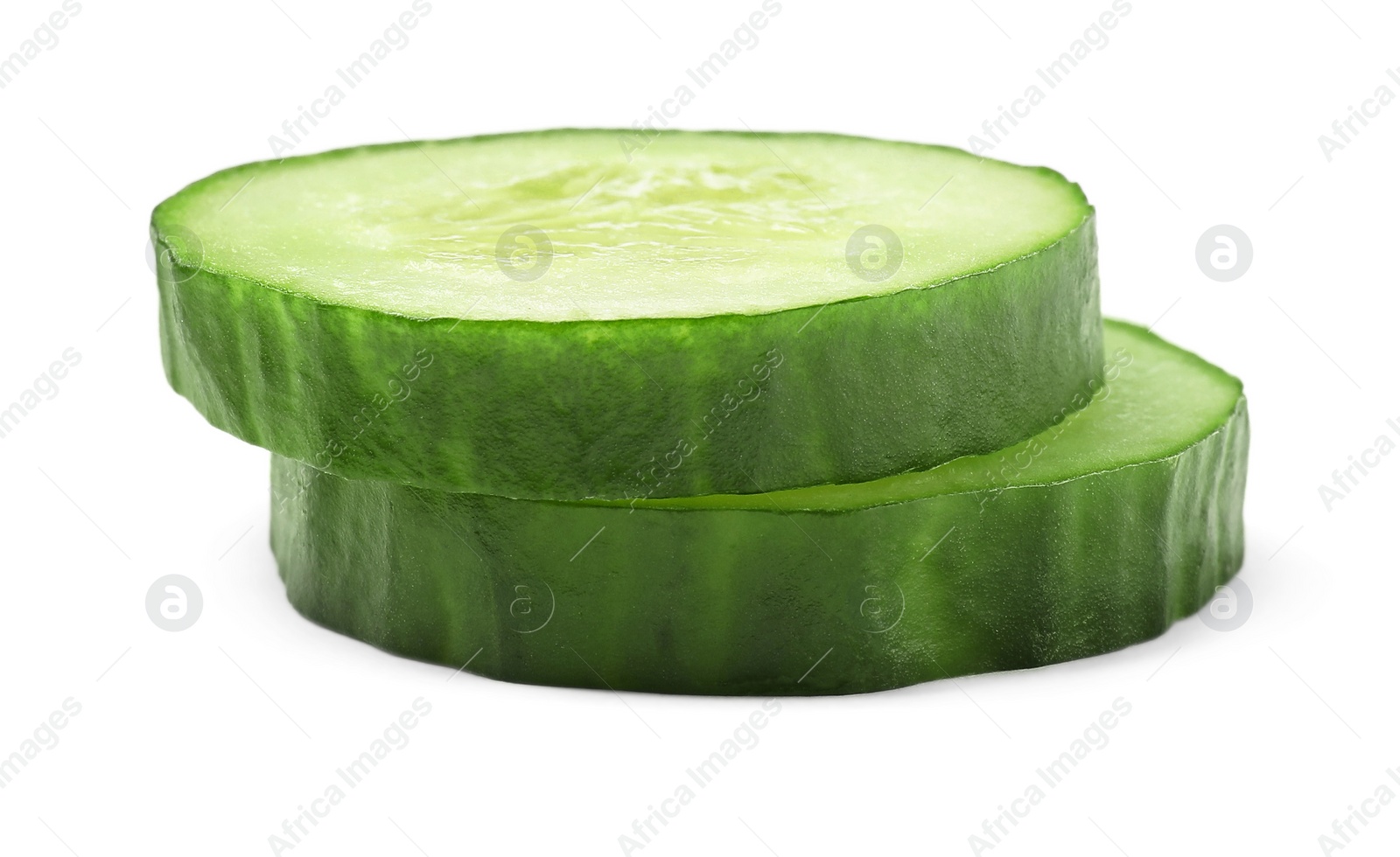 Photo of Slices of fresh cucumber isolated on white