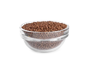 Photo of Buckwheat tea granules in glass bowl on white background