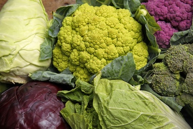 Different cabbages as background. Healthy food