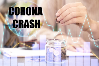 Image of Corona crash. Woman putting money into glass jar at table, closeup