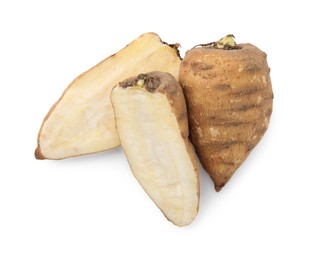 Whole and cut tubers of turnip rooted chervil isolated on white, top view