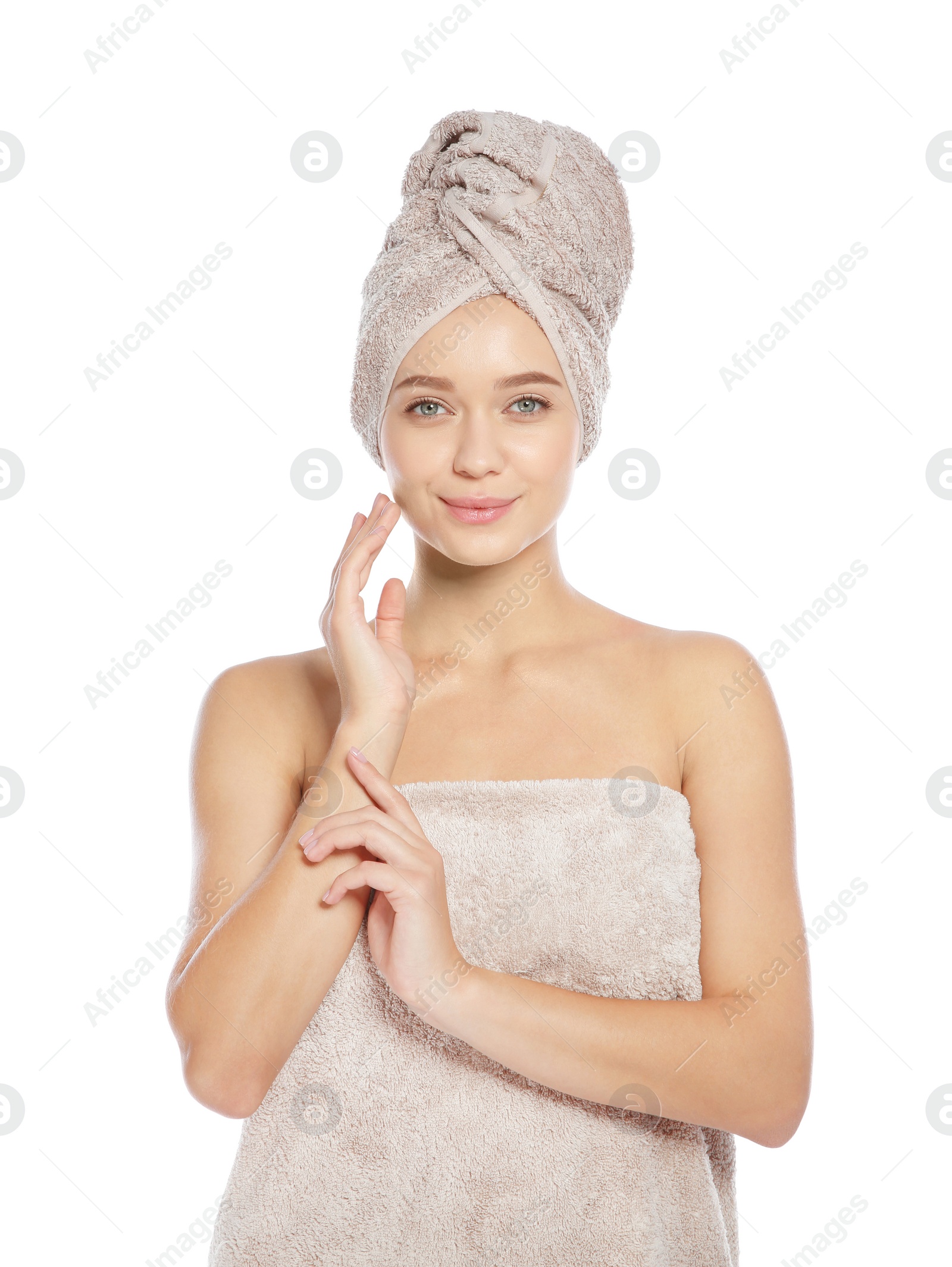 Photo of Portrait of young pretty woman with towels on white background