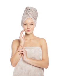 Photo of Portrait of young pretty woman with towels on white background