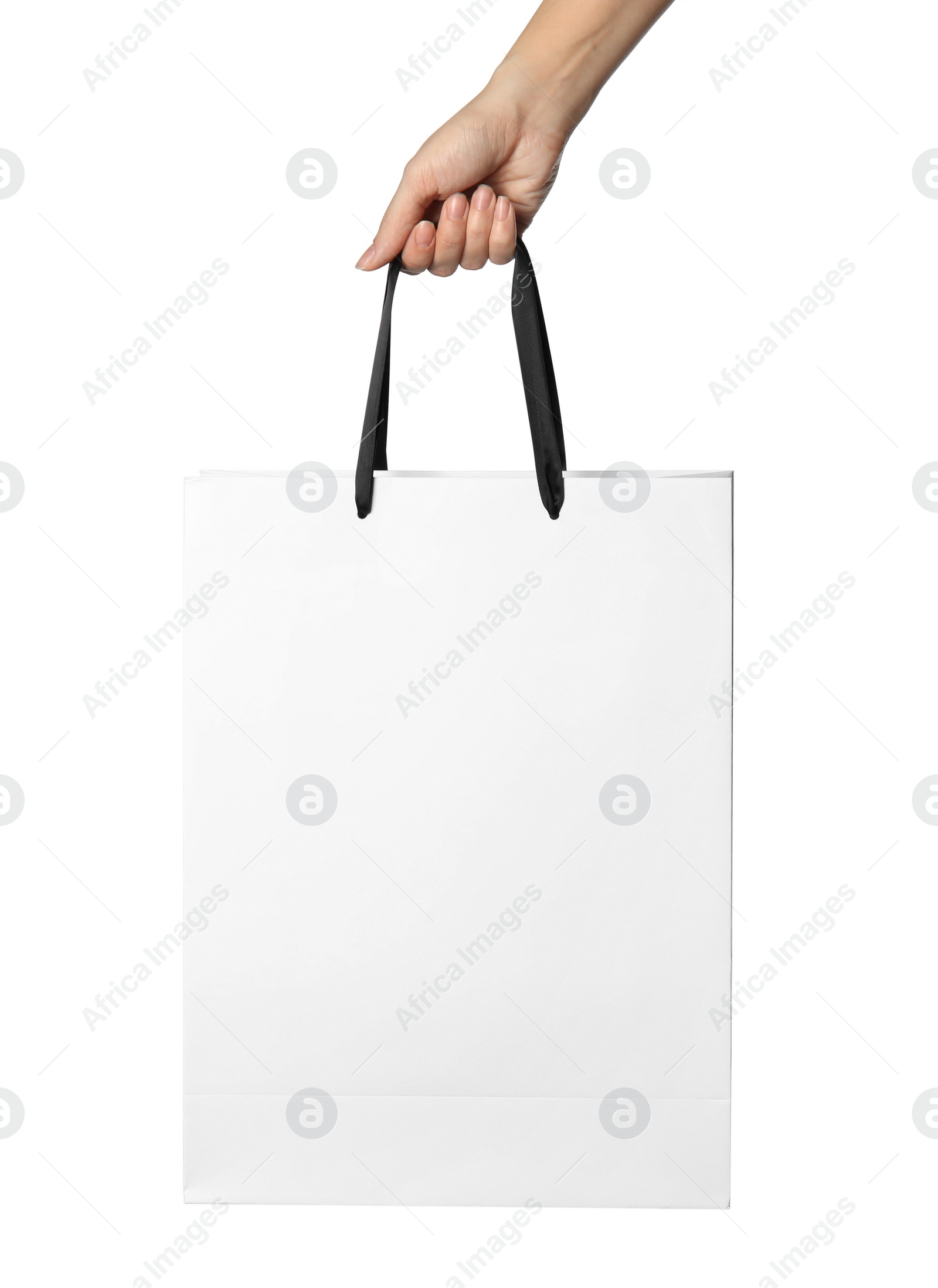 Photo of Woman holding paper shopping bag isolated on white, closeup