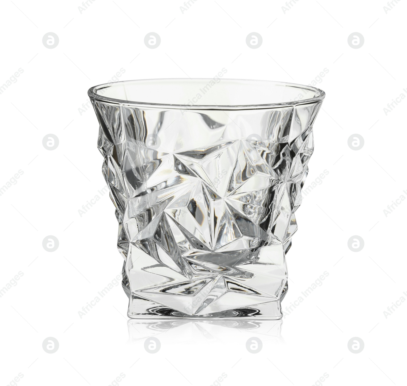 Photo of Empty glass for whiskey isolated on white