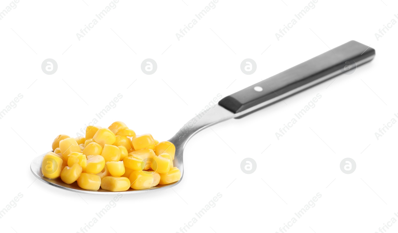 Photo of Delicious canned corn in spoon isolated on white