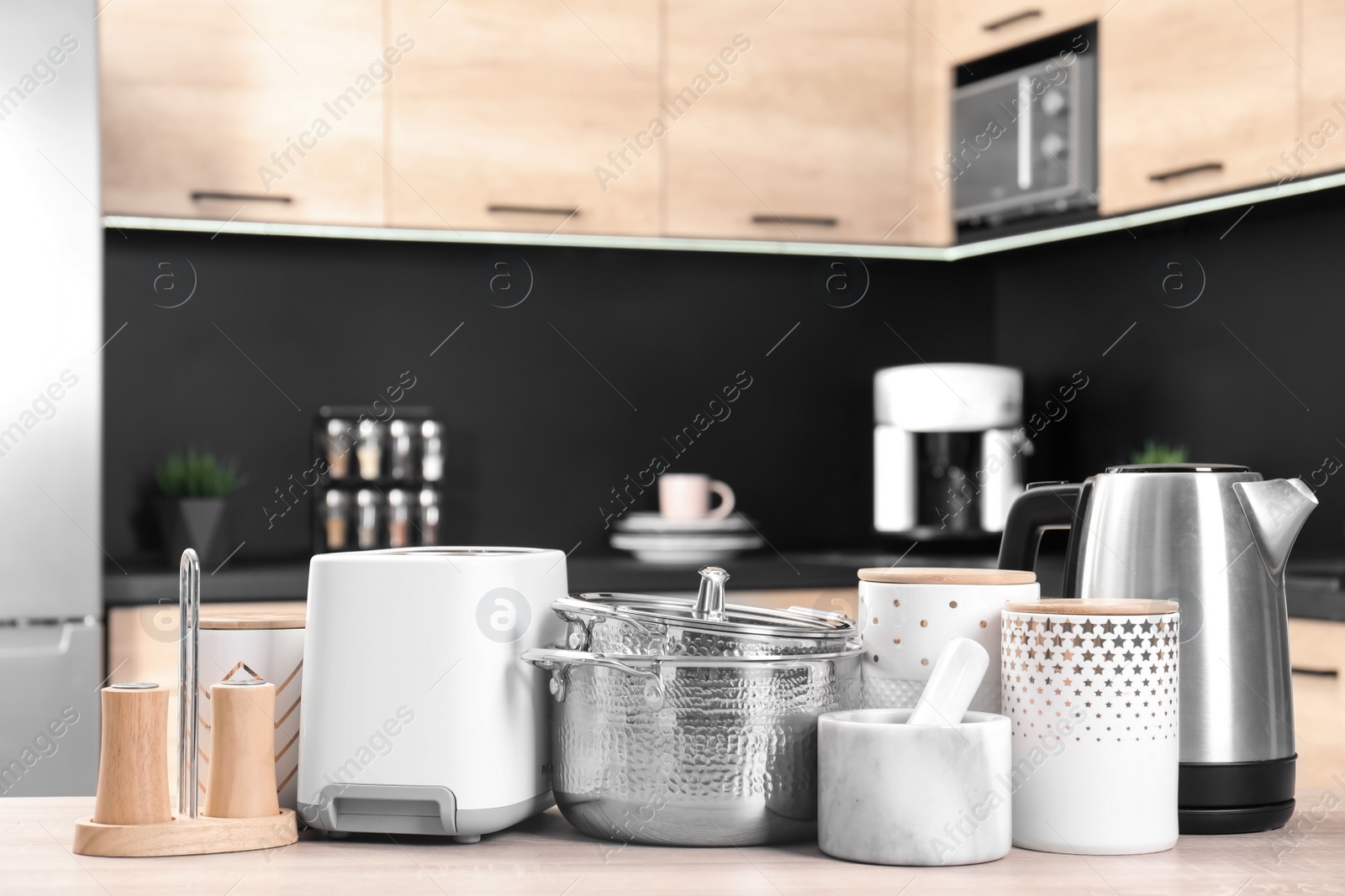 Photo of Set with modern domestic appliances in kitchen