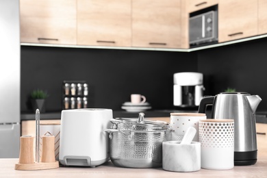 Set with modern domestic appliances in kitchen