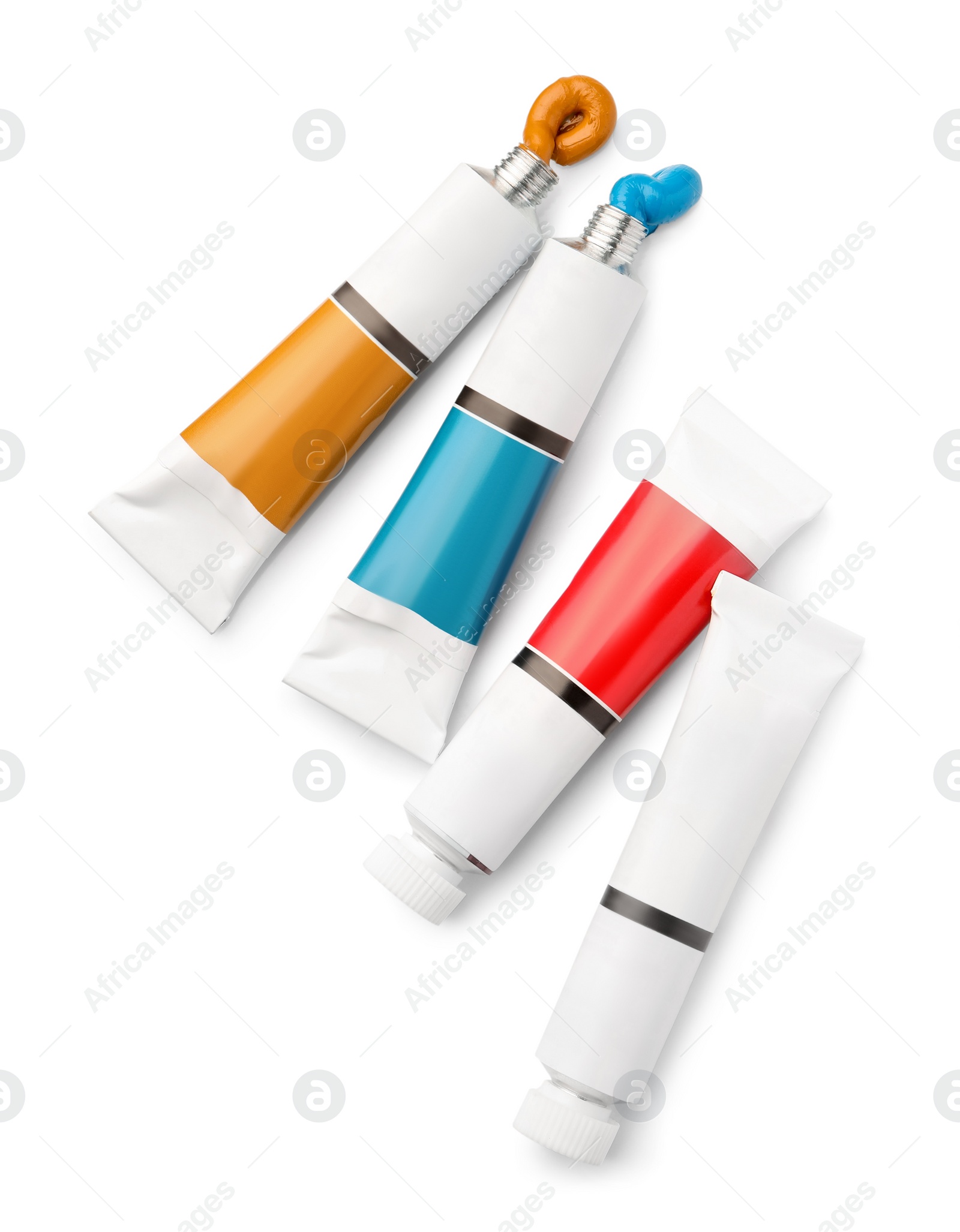 Photo of Tubes with oil paints on white background, top view