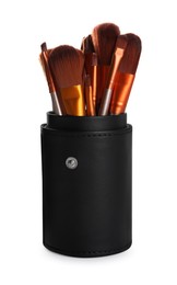 Photo of Leather holder with professional makeup brushes on white background