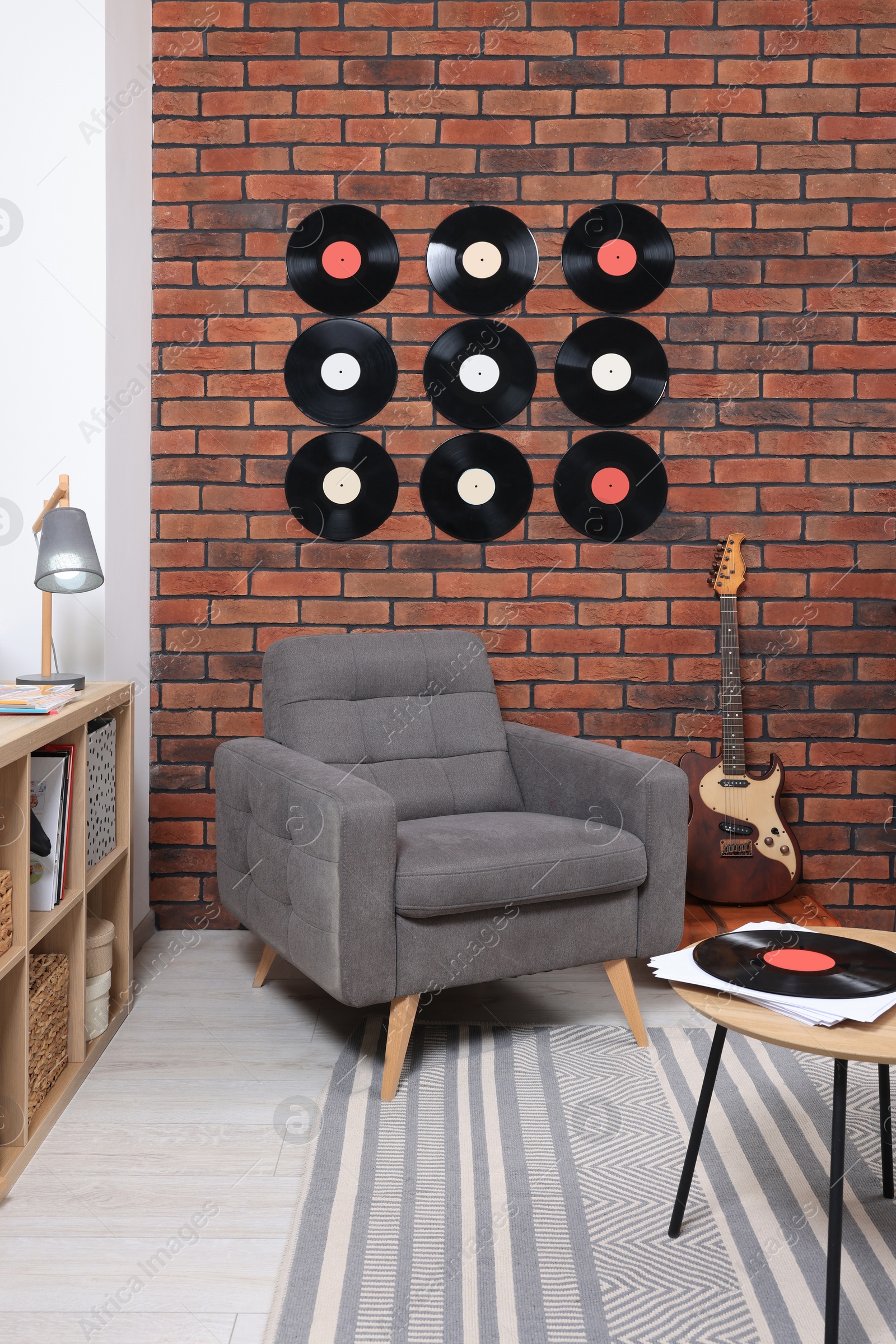 Photo of Living room decorated with vinyl records. Interior design